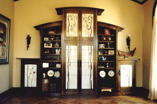 A 5 piece fumed white oak, stained glass and wrought iron wall unit